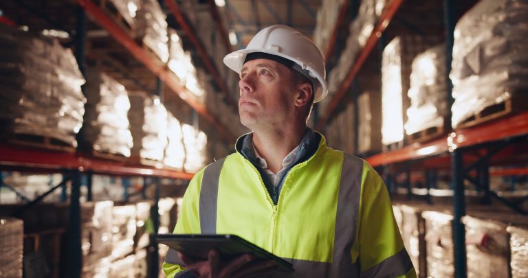 checklist, tablet and thinking with man in warehouse for online order of distribution or shipping f