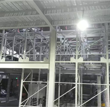 Automated high-density electronics warehouse using a Four-Way Pallet Shuttle System for pallet storage and retrieval